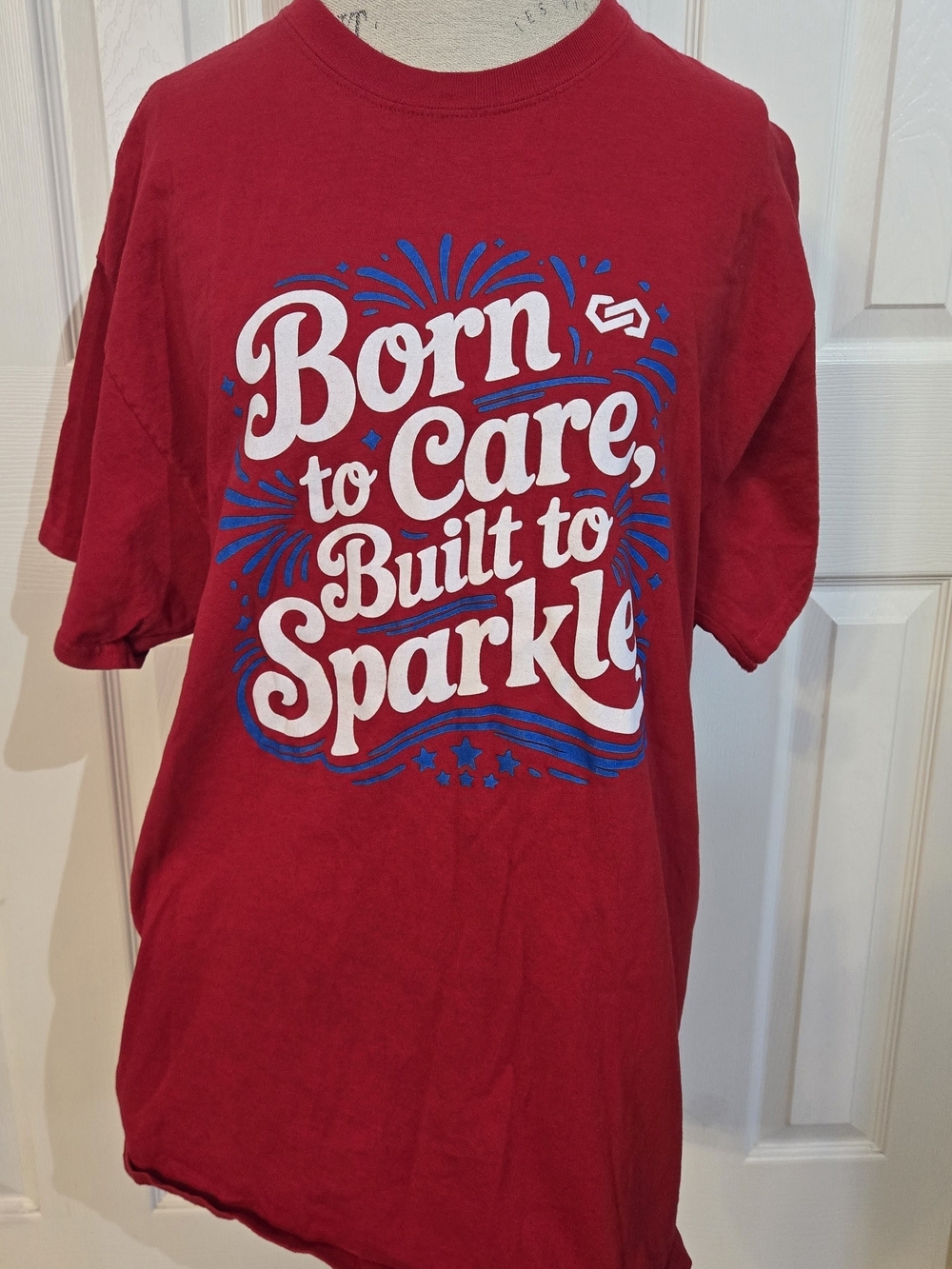 Red Graphic Tee "Born to Care, Built to Sparkle"